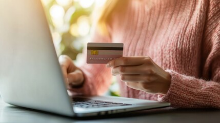 Young woman order or purchase product on internet using laptop and make transaction payment by smartphone. Online shopping lifestyle with credit card via internet banking on mobile application. Blithe