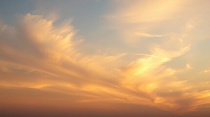 Fototapeta premium Ethereal Sunset with Wispy Cirrus Clouds