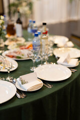 set table at a banquet in a restaurant	