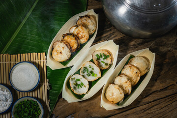 Khanom Krok is an ancient Thai dessert made from flour, sugar and coconut milk