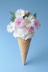 Fake ice cream cone with pink, white, and yellow flower edible decorations.