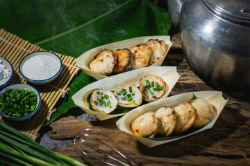 Khanom Krok is an ancient Thai dessert made from flour, sugar and coconut milk