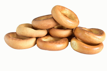 A pile of bagels on a white background.