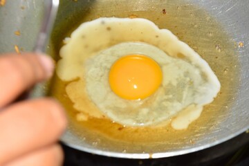 fried egg in a frying pan
