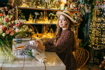 Woman Reading in a Cozy Cafe Environment Surrounded by Books and Flowers