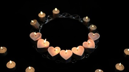 Heart-shaped candles placed in a decorative circle on a black background, surrounded by soft candlelight, candles heart shaped, decor, evening scene