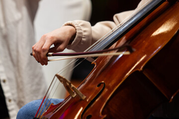 Hand of a musician playing the cello