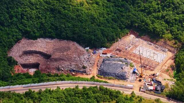 Aerial view Landfill garbage dump site in Koh Larn island of Thailand. Concept Asia ecological problem of plastic pollution.