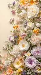 A vibrant mix of colorful flowers arranged artistically on a soft, neutral background, showcasing nature's beauty and elegance.