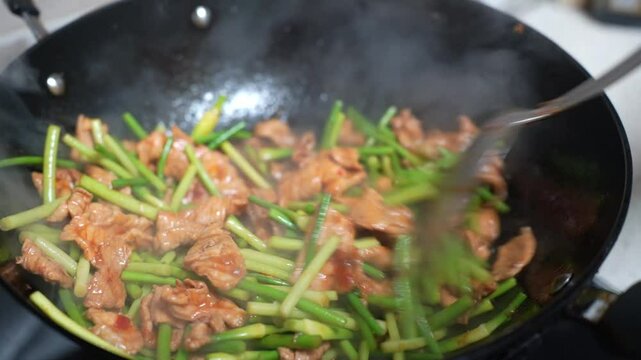 stir fried garlic sprouts and pork