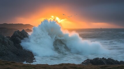 Dramatic sunset over crashing waves