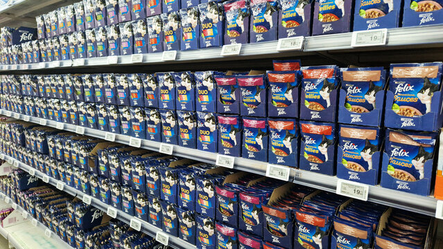 Kyiv, Ukraine - October 29, 2024: Wet cat food Purina Felix. Canned cat food in soft packaging. Assortment of cat food in the supermarket