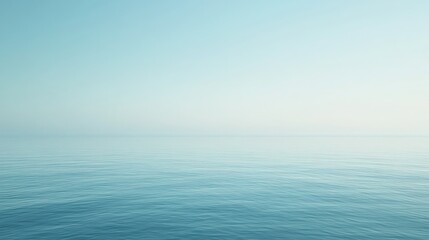 Obraz premium Expansive vista of a tranquil sea merging seamlessly with a soft gradient sky
