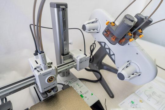 Suzano, Sao Paulo - Brazil - january 23, 2025: Unboxing the A1 Mini 3D printer with AMS module piece by piece
