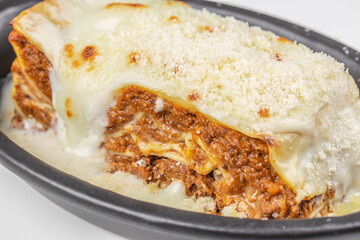 Traditional lasagna with meat sauce and melted cheese, baked, Close up