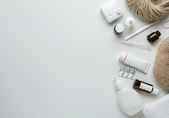 Natural medicine and self-care items on neutral background