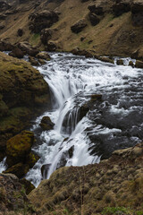 Naklejka premium Iceland – Majestic Waterfalls Amidst the Rugged Beauty of the Island