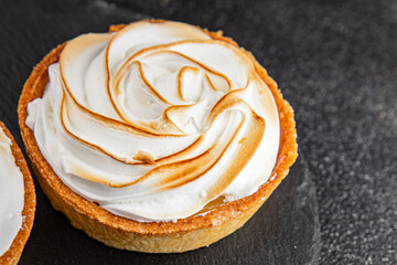 Lemon tart sweet dessert meringue, lemon curd, shortcrust pastry tasty fresh delicious gourmet food...