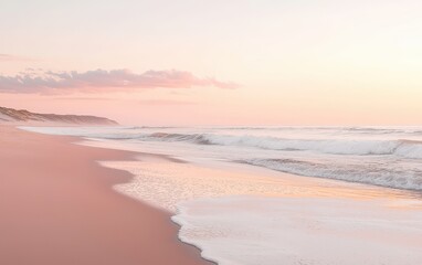 Fototapeta premium A peaceful beach at sunrise, with soft pink and orange hues in the sky and gentle waves washing ashore