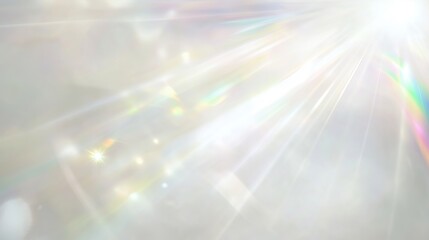 Iridescent white background with rainbow light rays and prismatic lens flare. Soft-focus bokeh effect creating a dreamy and ethereal atmosphere with chromatic aberration and blurred textures.