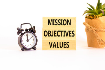 Mission objectives values symbol. Concept words Mission Objectives Values on beautiful blocks....