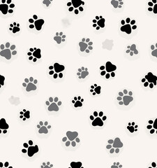Fototapeta premium Black & Gray Paw Prints Scattered on White