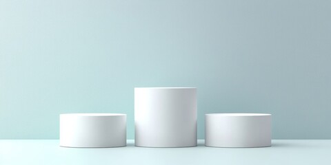 Minimalist Product Display Three White Cylindrical Platforms on Light Blue Background