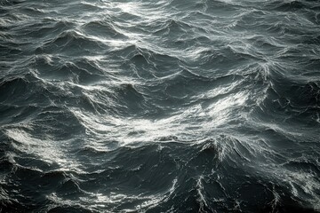 Dark Turbulent Ocean Waves Under Reflected Light at Dusk