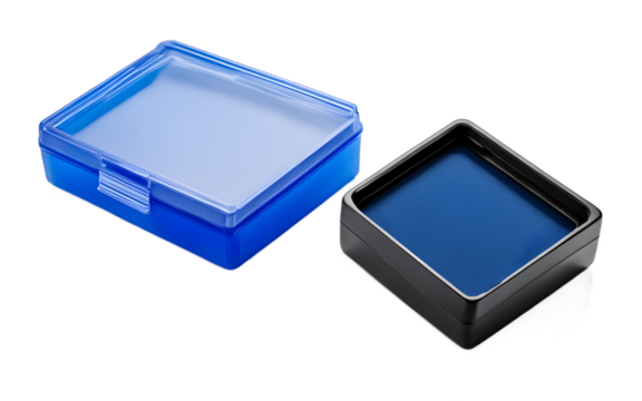 A blue ink stamp pad in a plastic case, isolated on a empty plain background