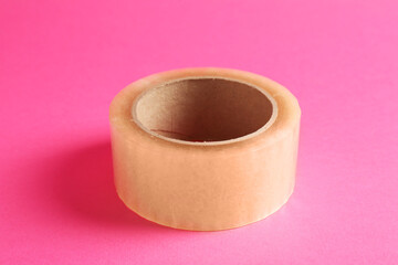 One masking tape on pink background, closeup