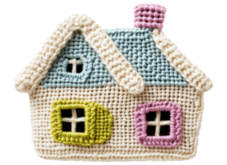 Decorative crochet house with colorful window accents displayed in a bright setting