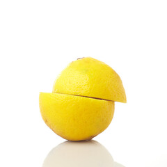 Fresh Lemon Isolated in White Background With a Clean Cut Revealing Its Vibrant Yellow Interior