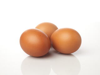 Brown Eggs Isolated in White Background Showcasing Their Smooth Texture and Natural Color Scheme
