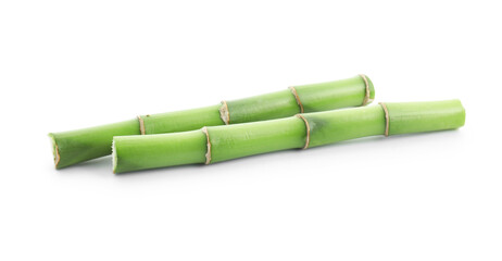 Fototapeta premium Cut green bamboo stems isolated on white