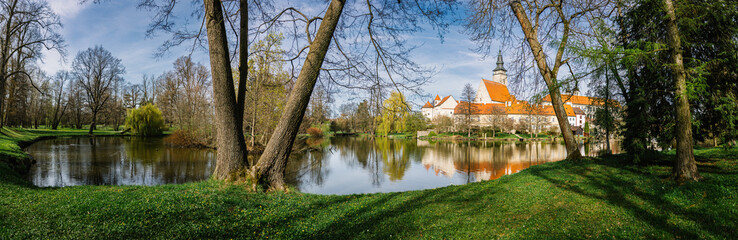 Telc and park with pond in spring, old town in Czech Republic