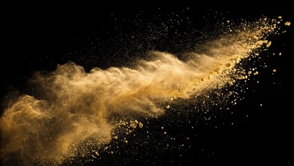 Gold Glitter Texture Isolated on Black Background. Golden sand explosion isolated on black background. Abstract sand cloud. Golden colored sand splash against dark background. 