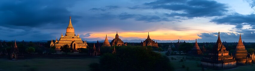 Fototapeta premium Majestic Buddhist Temples at Sunset in Bagan Myanmar s Ancient Cultural Landscape The pagodas and stupas of Bagan an archaeological site in central Myanmar silhouetted against a dramatic sky at dusk