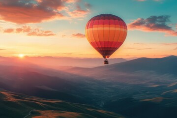 Obraz premium A vibrant hot air balloon bathes the sky with its fiery reds and oranges. Majestically poised at the center, it gracefully arcs to the right, capturing the essence of adventure in flight