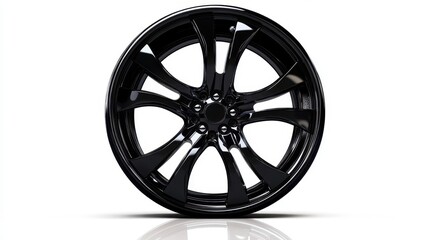 Obraz premium A shiny black car wheel, isolated on a white background, highlighting its sleek and polished surface.