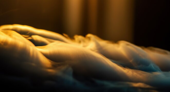 Ethereal waves of golden light and smoke in a mystical atmosphere
