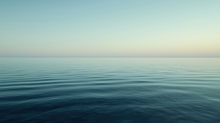 Fototapeta premium Calm ocean surface at dawn or dusk