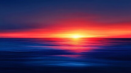 Obraz premium Vivid sunset paints the sea with brilliant colors and hues