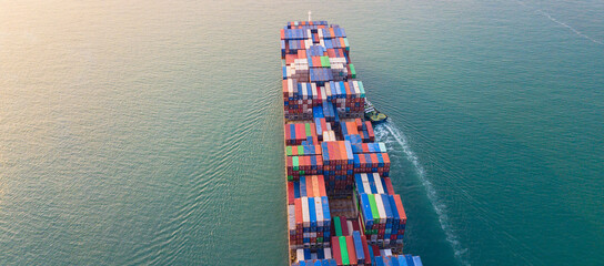 Fototapeta premium Container ships sail the seas carrying goods for sale all over the world.