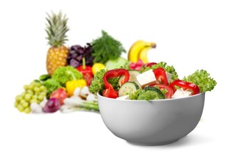 Tasty healthy fresh salad bowl with ingredients.