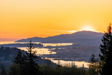Burnaby Mountain Park in sunset time. Overlooking the upper arms of Burrard Inlet. Burnaby, BC, Canada.