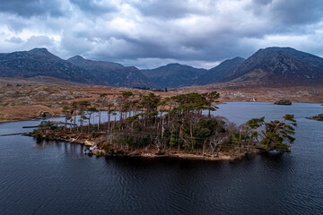 Pine Island on Derryclare Lough, showcasing Connemara’s dramatic landscape, Ireland