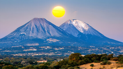 Fototapeta premium Majestic Volcanoes Arise Under a Golden Sunset