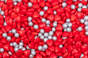 Red Heart-Shaped Candy and Silver Dragées Background - Valentine's Day Decorative Sprinkles Pattern for Baking and Confectionery Photography