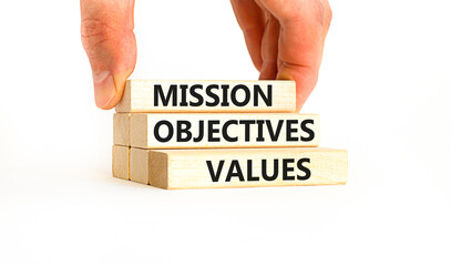 Mission objectives values symbol. Concept words Mission Objectives Values on beautiful blocks....