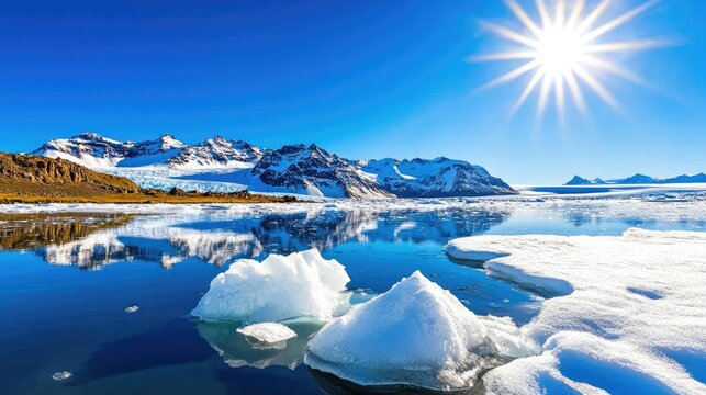 A stunning polar landscape with icebergs and mountains under a clear blue sky.